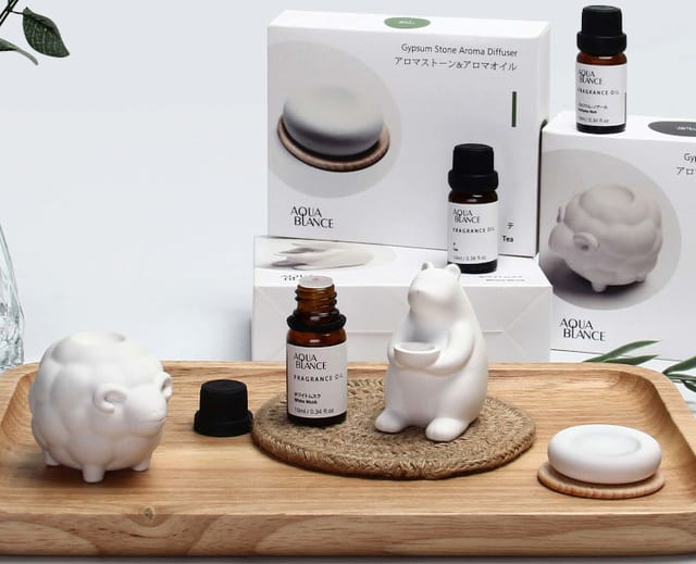 Difusor de piedra de yeso con aceites aromáticos